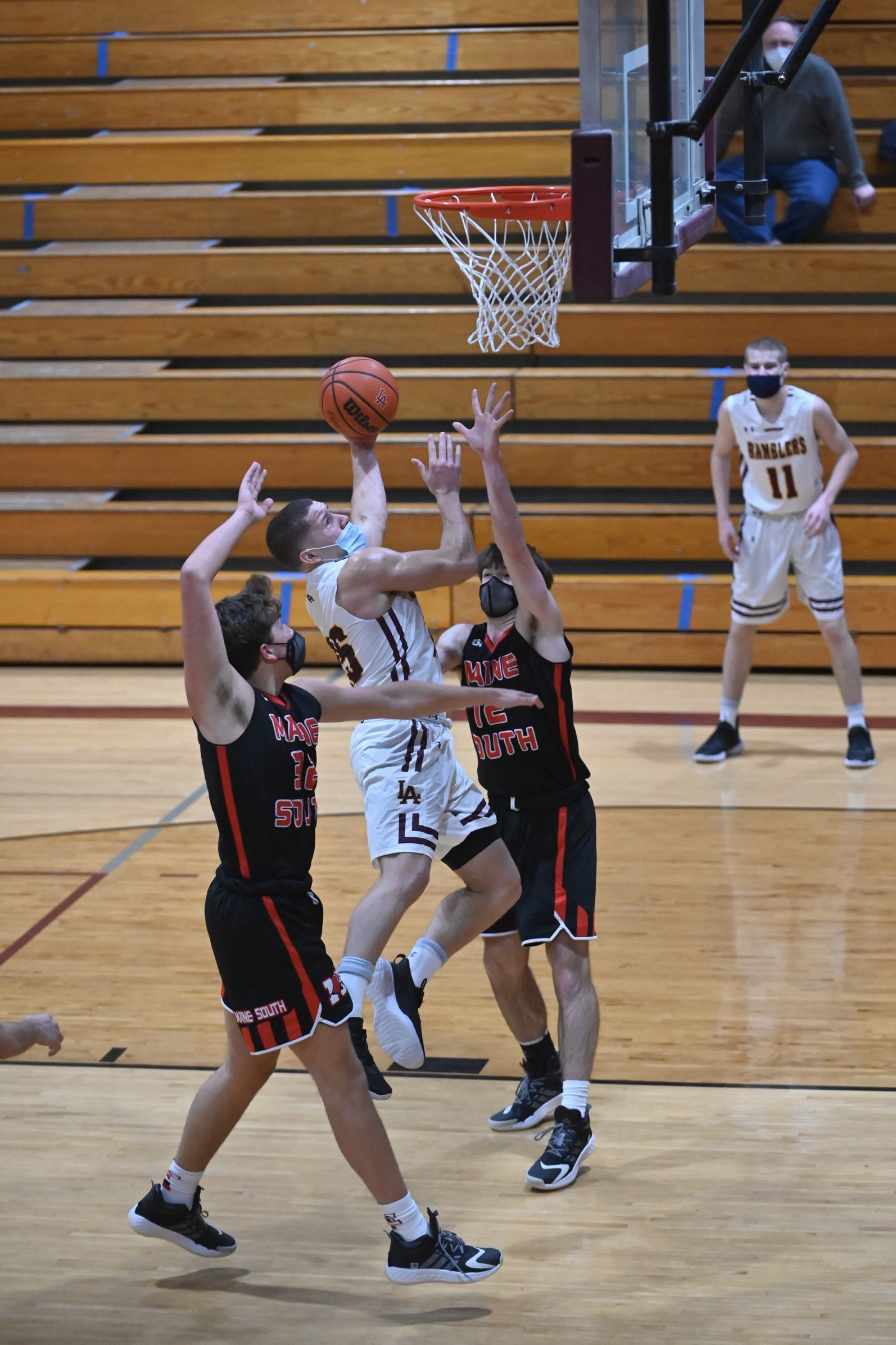 Loyola boys compete in township's first high school basketball game of ...